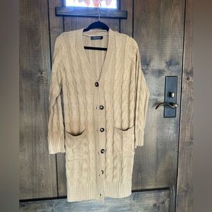 Nice long tan travel sweater really great with jeans and boots
